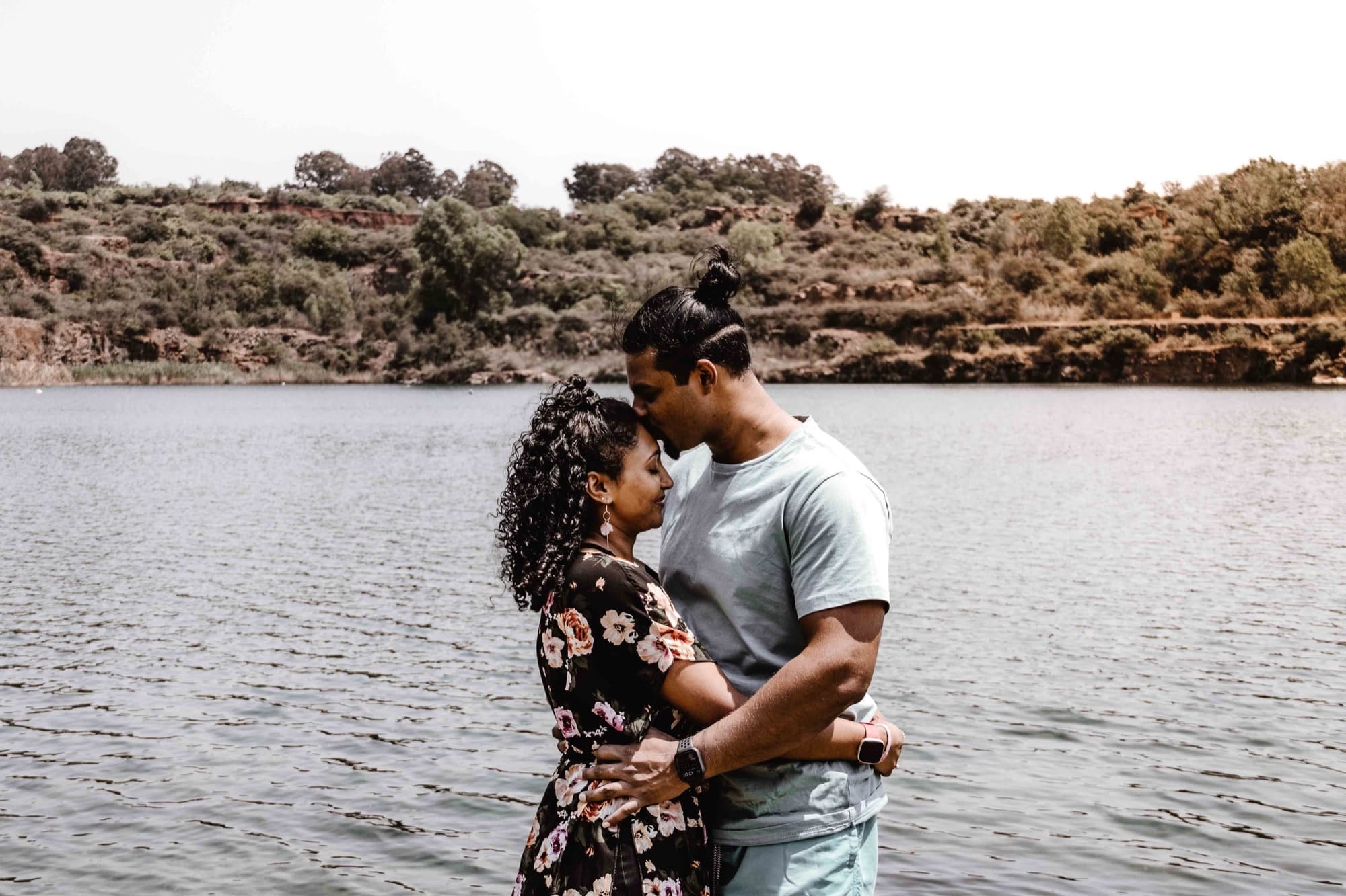 Andrew and Latisha Govender by the lake at sunset