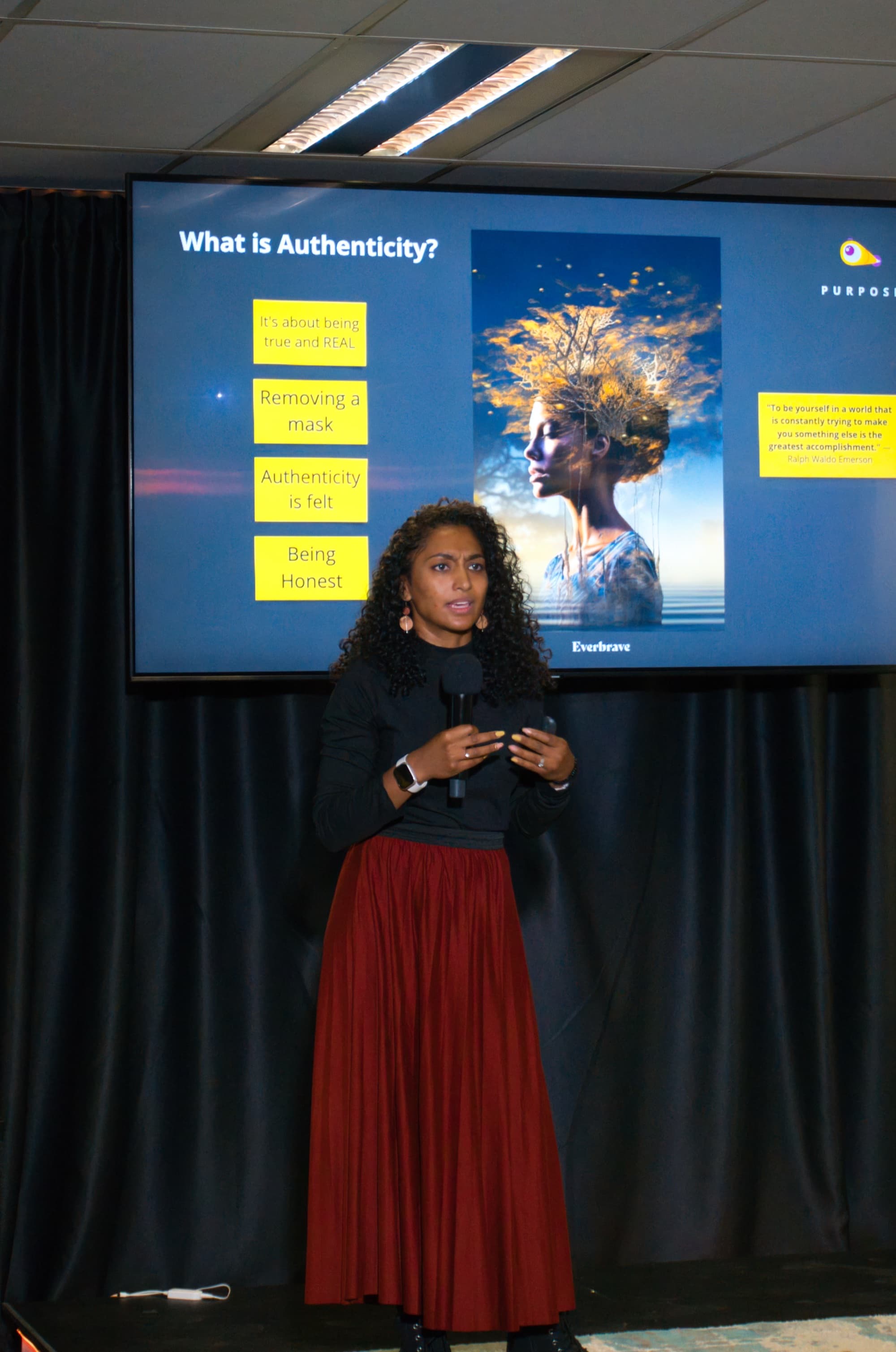 Latisha Govender speaking on stage